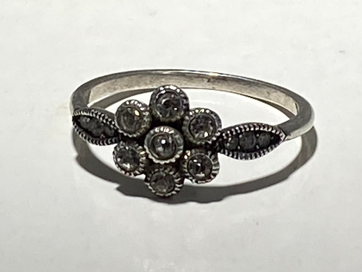 STAINLESS STEEL ANTIQUE 7 ROUND CRYSTAL FLOWER RING