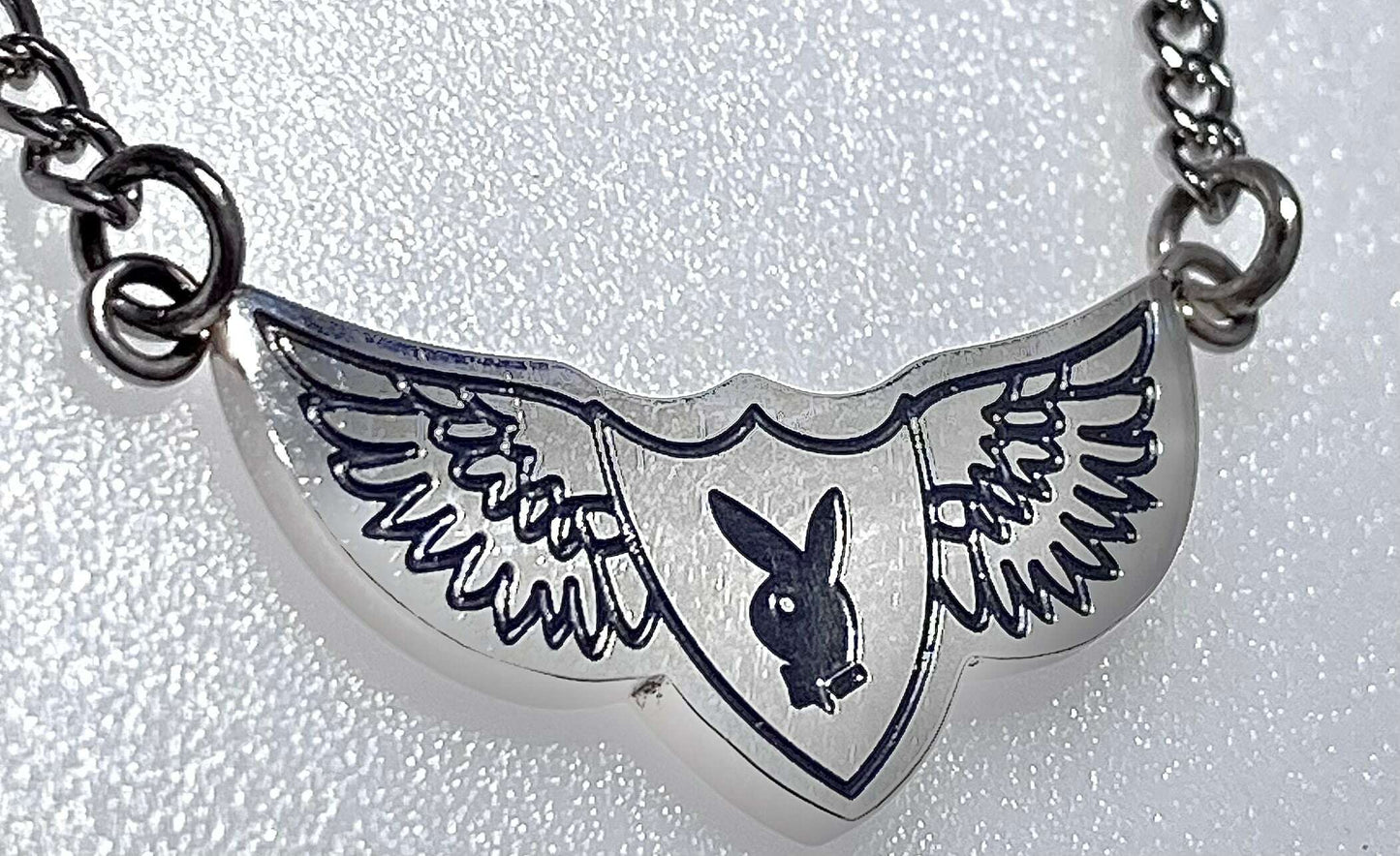 Playboy Bunny Wing Head Finish with Black Color on a Curb Chain - COLO