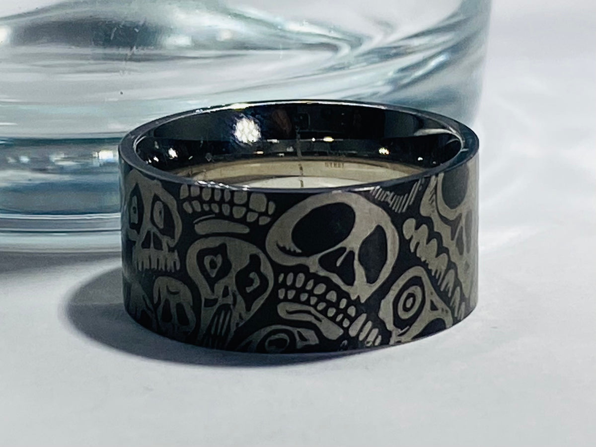Madison Collections Men's Stainless Steel Black Band with Laser-Etched Skeleton Skull Faces Pattern (Size 8)
