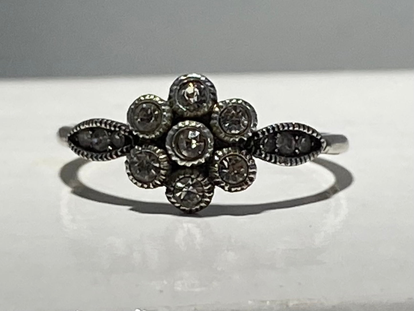 STAINLESS STEEL ANTIQUE 7 ROUND CRYSTAL FLOWER RING