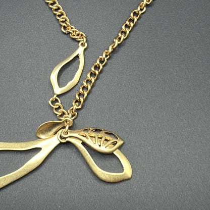 Gold-Tone Curb Chain Necklace with Open Teardrop Pendant