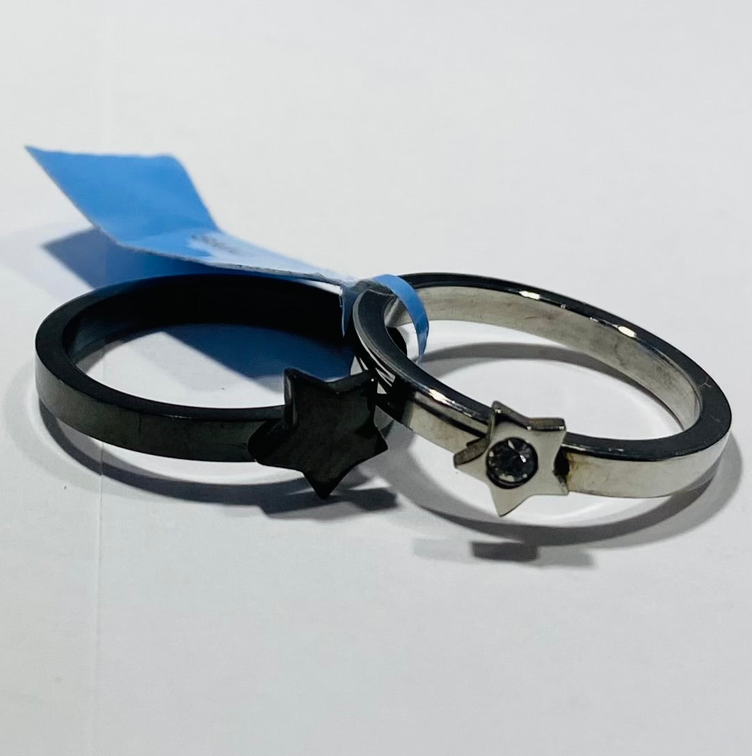 TWO RING IN ONE BLACK RING WITH A STAR AND A SILVER RING WITH BLACK CRYSTAL STONE IN IT STAINLESS STEEL 5"