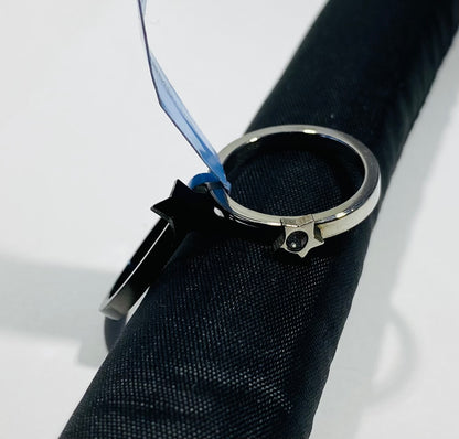 TWO RING IN ONE BLACK RING WITH A STAR AND A SILVER RING WITH BLACK CRYSTAL STONE IN IT STAINLESS STEEL 5"