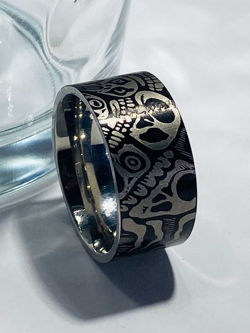 Madison Collections Men's Stainless Steel Black Band with Laser-Etched Skeleton Skull Faces Pattern (Size 8)