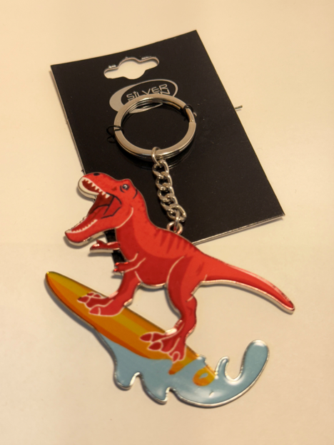 Surfing T-Rex Fashion Keychain – Enamel & Metal Key Ring / Bag Charm
