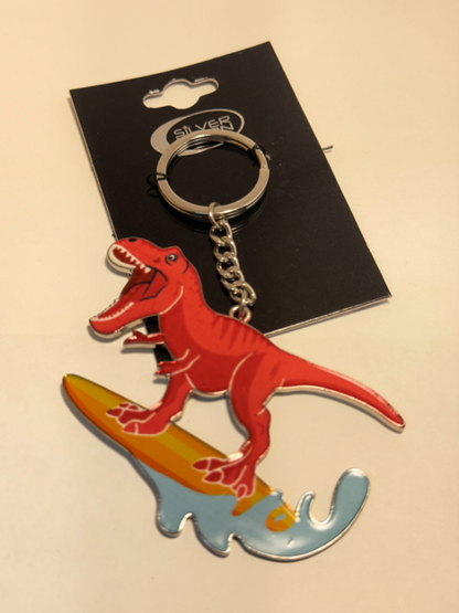 Surfing T-Rex Fashion Keychain – Enamel & Metal Key Ring / Bag Charm