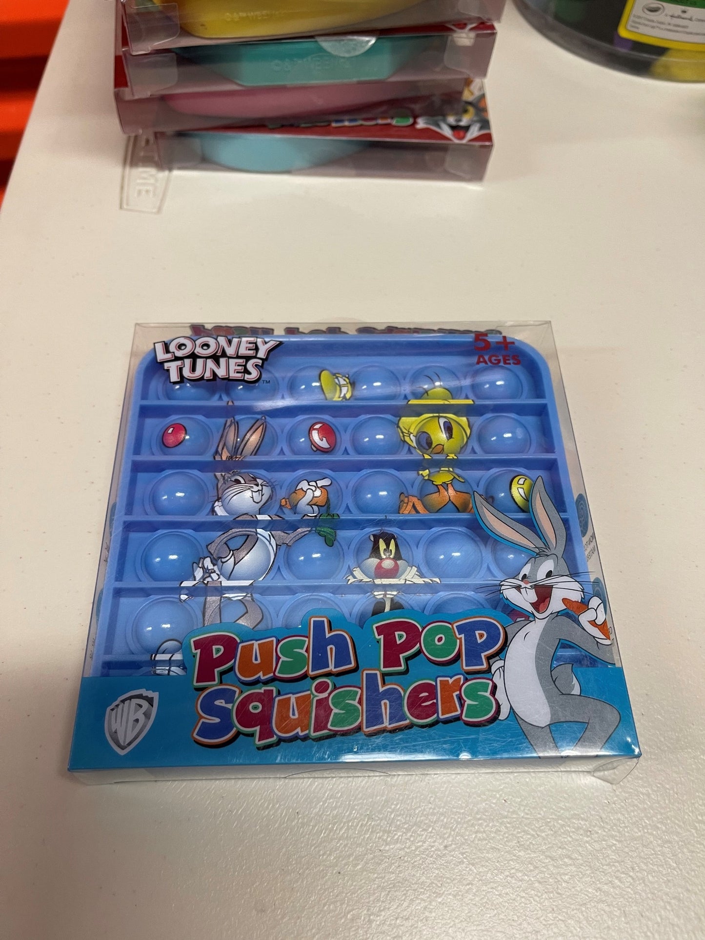 Looney Tunes  Push Pop Squishies Squishers Backpack Fidget Toy SQ BLUE